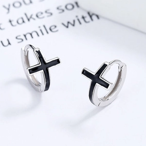 Detailed view of 925 sterling silver cross hoop earrings with black enamel finish