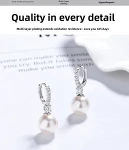 Detail of S925 sterling silver pearl earrings with micro-set zircon and plated finish