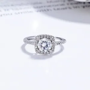 Macro shot of S925 sterling silver halo ring with round moissanite and square diamonds
