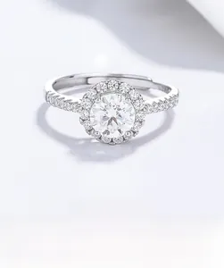 Macro shot of S925 sterling silver ring featuring halo set moissanite and side stones