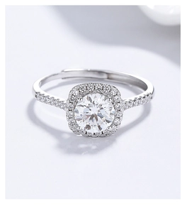 Macro shot of 925 silver halo ring with round moissanite and adjustable band detail