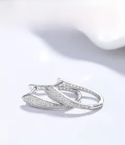 Detailed view of S925 sterling silver U-shaped earrings with zircon micropave plating