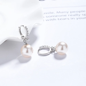 Elegant 925 silver pearl drop earrings featuring a sparkling zircon hoop and white shell pearls