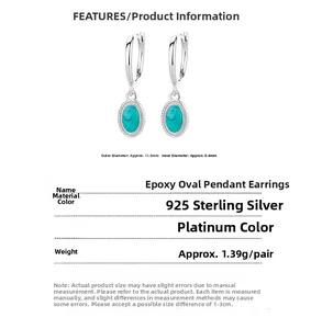 Macro detail of 925 silver green enamel hoop earrings with size and weight specifications