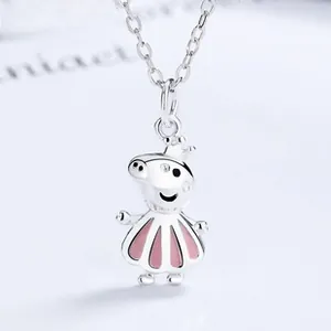 Close-up of S925 silver Peppa Pig pendant with pink enamel dress and silver crown
