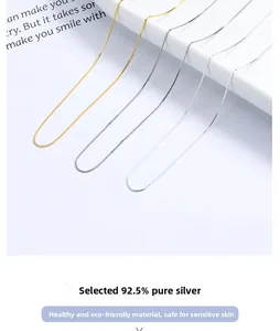 Detailed close-up of 925 sterling silver box chains in gold and silver finishes