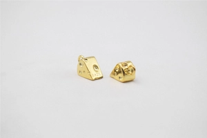 Close-up of golden S925 sterling silver cheese charms with realistic textured holes