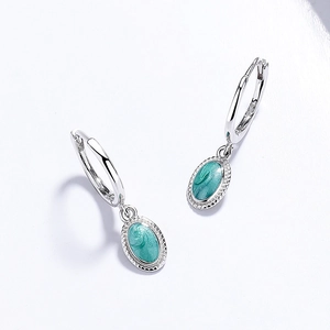 S925 sterling silver drop earrings with teal enamel oval pendants and beaded edge detail