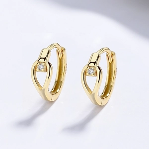 Elegant 925 sterling silver hollow heart earrings with gold plating and zircon stones