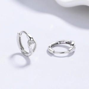 Minimalist 925 sterling silver drop earrings with single zircon stone and twisted design