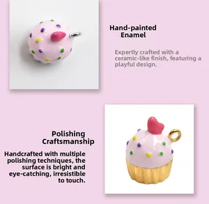 Detailed close-up of pink enamel cupcake charm with gold base and colorful polka dots