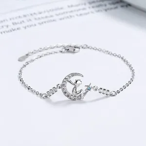 Detail of S925 sterling silver Little Prince and moon bracelet with blue zircon accents