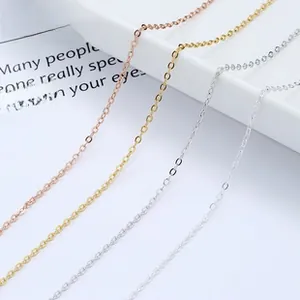 Macro detail of fine S925 sterling silver snake chains in gold, rose gold and silver
