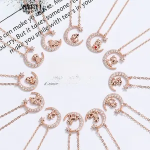 Rose gold moon and star necklaces featuring various zodiac animal pendants in a set