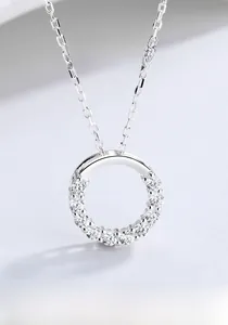 Detail of S925 sterling silver ring pendant necklace with paved zircon stones