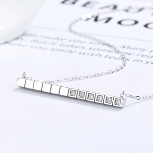 Minimalist S925 silver horizontal bar necklace with polished finish and cubic zirconia
