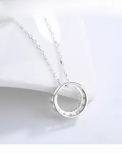 Detail of S925 silver ring pendant with sparkling zircons and adjustable extender chain