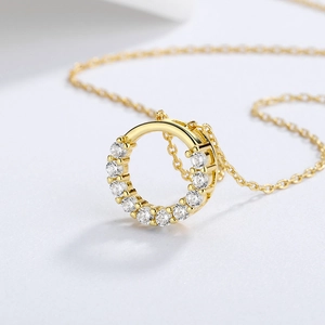 Elegant S925 silver necklace with sparkling crystal encrusted ring pendant in gold finish