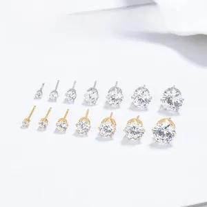 Detail of 14-piece sterling silver zircon stud earrings in various sizes and finishes