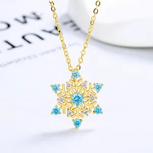 Schneeflocken Anhänger Kette aus S925 Silber mit blauem Zirkonia in Gold-Finish