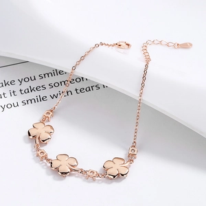 Elegant 925 sterling silver four leaf clover bracelet with white crystals in rose gold finish