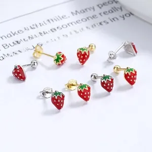 Detailed view of strawberry enamel stud earrings with 925 sterling silver hallmark