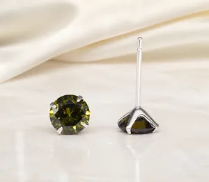 Detail of 925 sterling silver four-prong olive green zircon stud earrings for women
