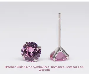 Close-up of pink zircon stud earrings in 925 sterling silver four-prong setting