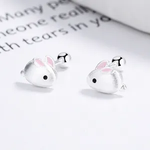 Cute 925 sterling silver rabbit stud earrings with matte brushed finish and pink enamel details