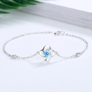 S925 sterling silver four-leaf clover bracelet with light blue gemstone and zircons