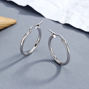 Elegant S925 sterling silver hollow hoop earrings with a minimalist geometric design