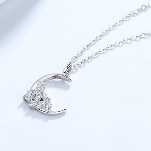 Elegant S925 sterling silver moon pendant necklace with pavé cubic zirconia sparkling stones