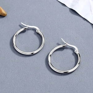Elegant 925 sterling silver geometric hollow round hoop earrings with polished finish