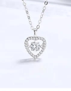 Detailed view of S925 sterling silver heart necklace with sparkling dancing stone center