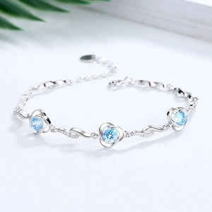 S925 sterling silver four-leaf clover bracelet with blue zircons and heart charms