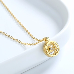 Elegant gold-plated S925 sterling silver necklace featuring a dancing stone round pendant