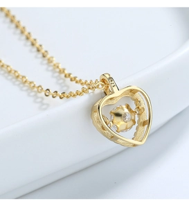 Macro view of S925 sterling silver heart pendant with shimmering center stone detail