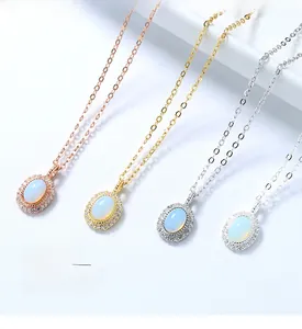 Detail view of 925 silver moonstone necklaces in rose gold, gold, and white gold finishes