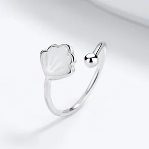 Detailed view of 925 sterling silver open ring with white shell clover and silver bead