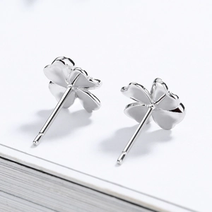 Minimalist S925 sterling silver four-leaf clover stud earrings with a high-polished finish