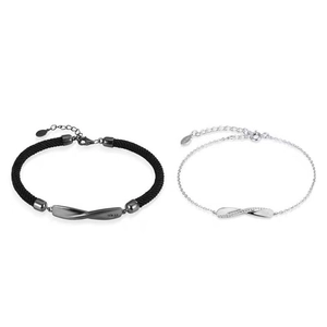 Coppia di bracciali Mobius in argento s925 con corda nera intrecciata e incisione No.52