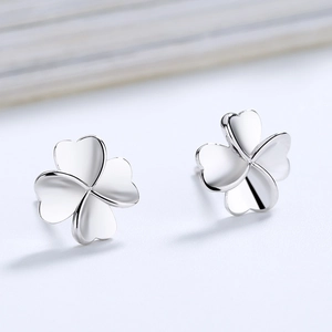 Elegant s925 sterling silver four-leaf clover stud earrings with polished mirror finish