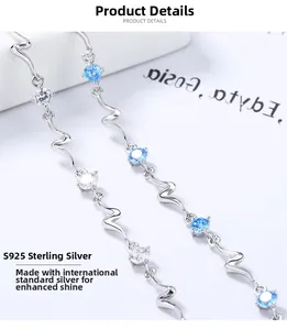 Detailed close-up of S925 silver wave chain with blue and white zircon gemstones