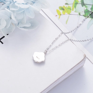 S925 sterling silver necklace with flower pendant showing hallmark on silver chain