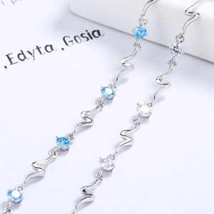 S925 silver Heart of the Ocean bracelet featuring blue crystals and wave design chain