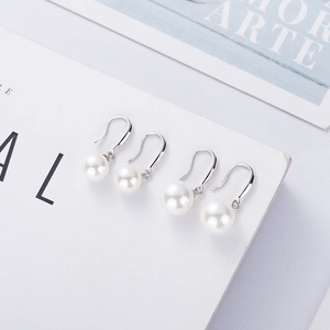 Elegant 925 sterling silver hook earrings featuring high-luster white round pearls