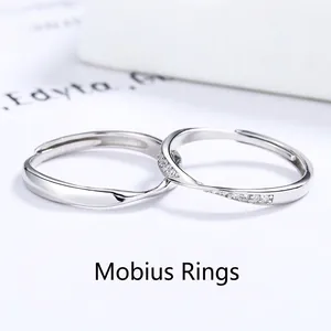 Adjustable Mobius sterling silver couple rings with sparkling pavé zircon setting