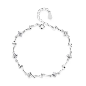 Elegant S925 sterling silver wave bracelet featuring sparkling blue and white zircon stones