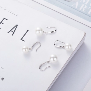 Elegant 925 sterling silver pearl hook earrings for women featuring white shell pearls