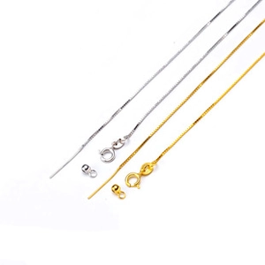 Detail of silver and gold 925 sterling silver box chains with spring ring clasps
